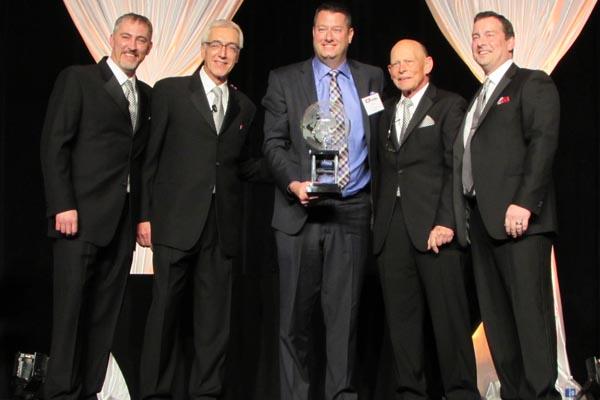 Carpetland USA Retailer of the Year - Eric Langan. L to R: Ryan Dunn (CarpetsPlus COLORTILE), Ron Dunn (CarpetsPlus COLORTILE), Eric Langan (The Langan Group), Jon Logue (CarpetsPlus COLORTILE) and Kevin Logue (CarpetsPlus COLORTILE)