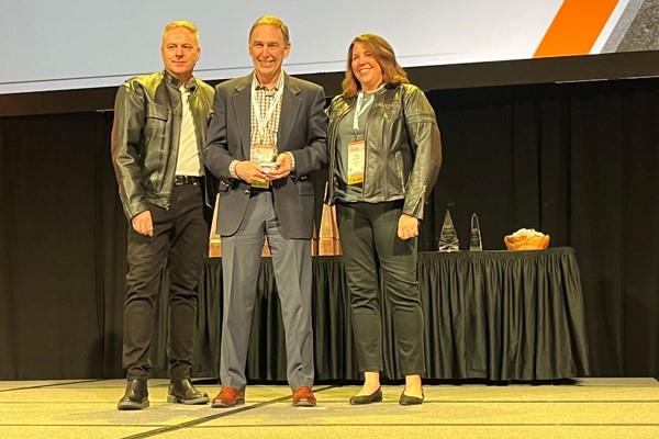 (L to R) NWFA president and CEO Michael Martin, NWFA Hall of Fame inductee Rick Holden and NWFA chair Julie Russell