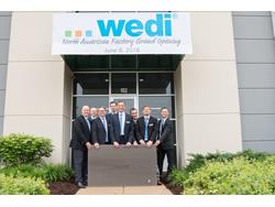 Shower Panel System Wedi Cuts Ribbon on Factory in Batavia, IL