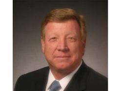 Dondero Steps Down at World Market Center