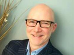 Torlys Promotes Andrew Davis