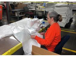 Mohawk Home Facility Sewing Medical Gowns for Healthcare Workers