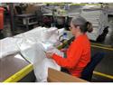 Mohawk Home Facility Sewing Medical Gowns for Healthcare Workers