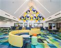 Designer Forum: Carpet tile and resilient flooring lay the foundation for a historic school’s redesign - June 2022