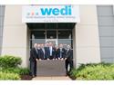Shower Panel System Wedi Cuts Ribbon on Factory in Batavia, IL